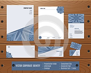 Corporate Identity Set: Presentation Folder, Letterhead, Envelope, Compliment Slip, Corporate Flyer, Business Card on Wood texture