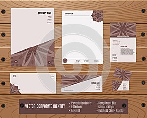 Corporate Identity Set: Presentation Folder, Letterhead, Envelope, Compliment Slip, Corporate Flyer, Business Card on Wood texture