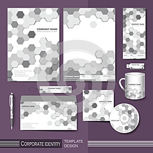 Corporate identity template with gray honeycomb elements.