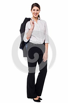Corporate lady with blazer slung over her shoulder