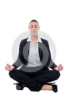 Corporate lady practicing meditation