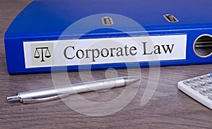 Corporate Law - blue binder in the office