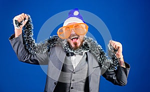 Corporate party ideas employees will love. Corporate christmas party. Man bearded cheerful hipster wear santa hat and
