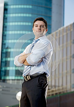 Corporate portrait attractive businessman outdoors urban office buildings