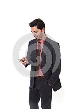 Corporate portrait of young attractive businessman of Latin Hispanic ethnicity with mobile phone