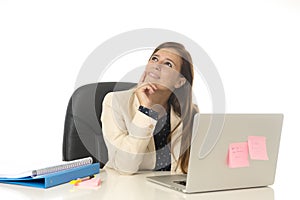 Corporate portrait young attractive businesswoman at office chair working at laptop computer desk