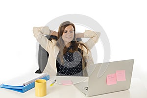 Corporate portrait young attractive businesswoman at office chair working at laptop computer desk