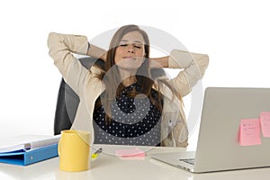 Corporate portrait young attractive businesswoman at office chair working at laptop computer desk