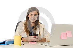 Corporate portrait young attractive businesswoman at office chair working at laptop computer desk