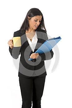 Corporate portrait young attractive latin businesswoman happy holding folder and coffee