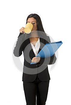 Corporate portrait young attractive latin businesswoman happy holding folder and coffee