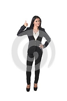 Corporate portrait of young attractive latin businesswoman in office suit smiling happy