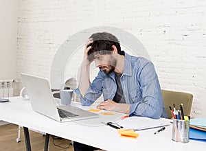 Corporate portrait young hispanic attractive hipster businessman working with computer modern home office