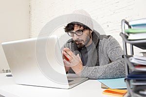 Corporate portrait young hispanic attractive hipster businessman working with computer modern home office