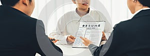 Corporate recruiter interview job applicant to discuss career goal. Shrewd