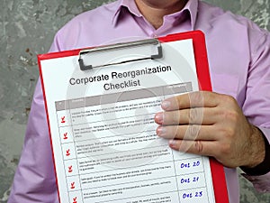 Corporate Reorganization Checklist sign on the page photo