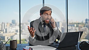 Corporate worker consulting mobile phone conversation. Mature boss talking cell