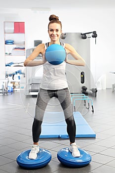 Correct posture, ball exercises in the gym