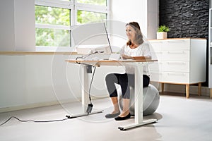 Correct Posture At Desk In Office