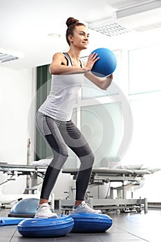 Corrective gymnastics. Correct posture, ball exercises in the gym