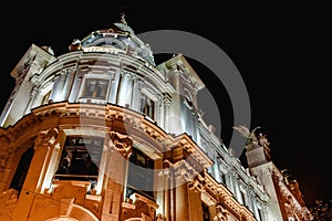 Correos building in the town hall square of the mediterranean city of Valencia, Spain, illuminated at night photo