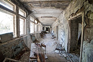 Corridor of abandoned middle school in Pripyat city in Chernobyl Exclusion Zone, Ukraine