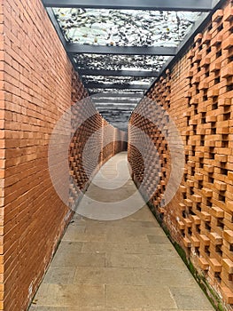 Corridor with brick walls
