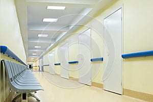 Corridor with chairs in hospital