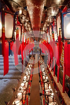 Corridor of Chinese lanterns in a row