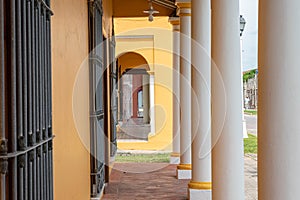 Corridor at the exterior of a typical yellow house