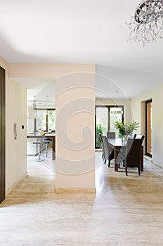 Corridor open to kitchen and dining area