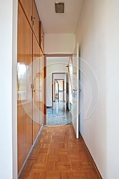 Corridor, room interior with wooden wardrobe in country house