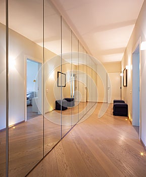 Corridor with wardrobes and mirrors