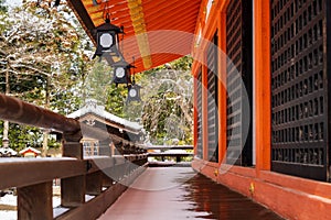 Corridor of Yasaka Shrine with snow in winter. Kyoto, Japan.