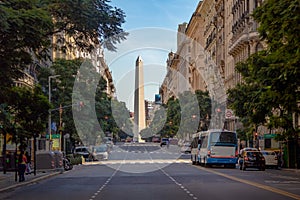 Corrientes Avenue with Obelisk on background - Buenos Aires, Argentina photo