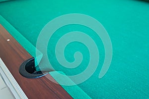 Corrner of table snooker hole .