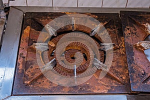 Corroded burner of industrial stove