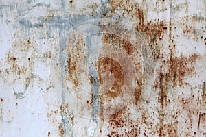 Corroded, painted white with spots of blue paint, old metal sheet. Background for your design.