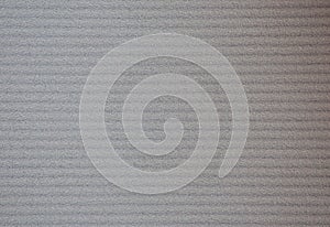 Corrugated aluminum surface with horizontal uniform stripes close-up