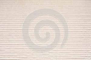 Corrugated cardboard for packing. abstract background horizontal lines with wavy lines of beige  color