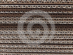 Corrugated cardboard for packing. abstract background horizontal lines with wavy lines of beige color