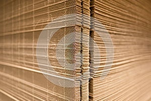 Corrugated cardboard for packing. abstract background horizontal lines with wavy lines of beige color