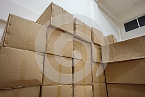 Corrugated Cardboard storage boxes stacked in warehouse