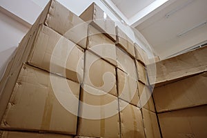 Corrugated Cardboard storage boxes stacked in warehouse