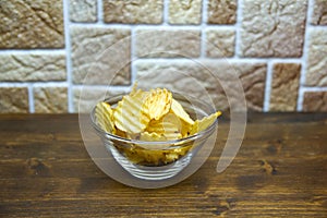 Corrugated chips inside a bowl seen from above