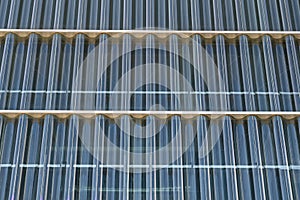 Corrugated glass. Wavy pattern of bluish color. Casa da Musica do Porto Porto Music House. Abstract image photo