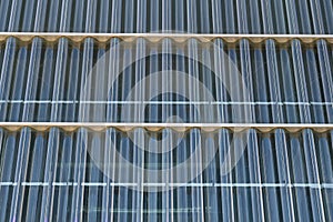 Corrugated glass. Wavy pattern of bluish color. Casa da Musica do Porto Porto Music House. Abstract image