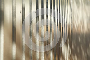 Corrugated metal fence