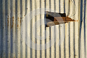 Corrugated Metal with a Hole