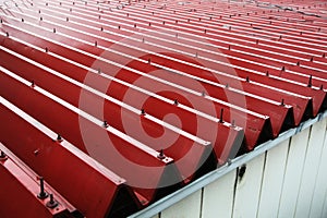 Corrugated metal sheet roof in red